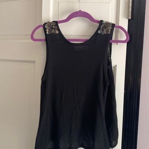 Laurie b. Black sleeveless tank top with sequined shoulders.